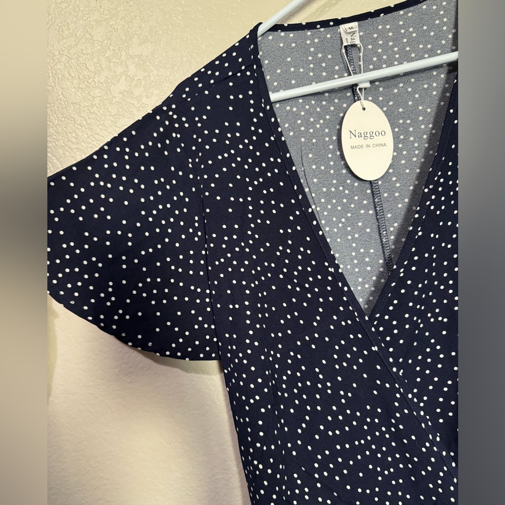 Never worn. Dark blue & white polka dot dress